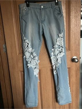 Women's Light Blue Jeans with White Lace Detailing